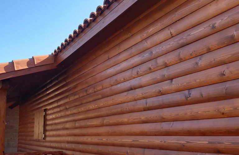 Revestimeinto de casas de madera en medio tronco D40